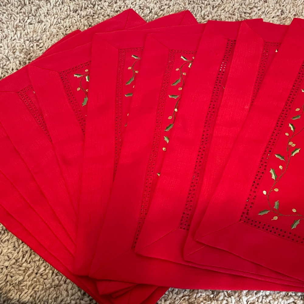 Set of 10 used fabric placemats- red with Holly border